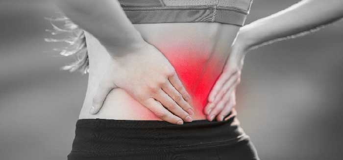 A girl having back pain